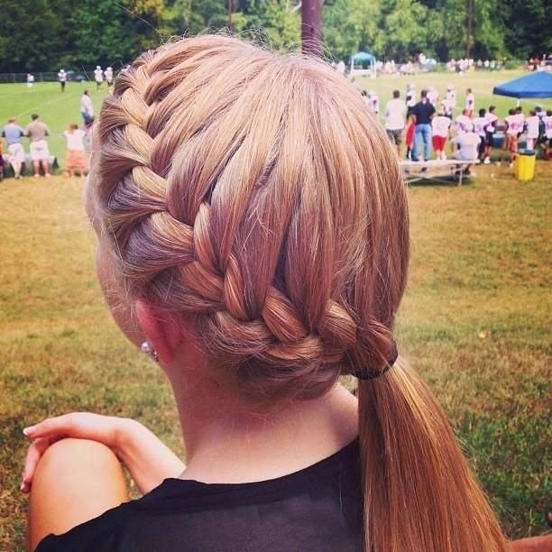 Image of Side braid softball hairstyle