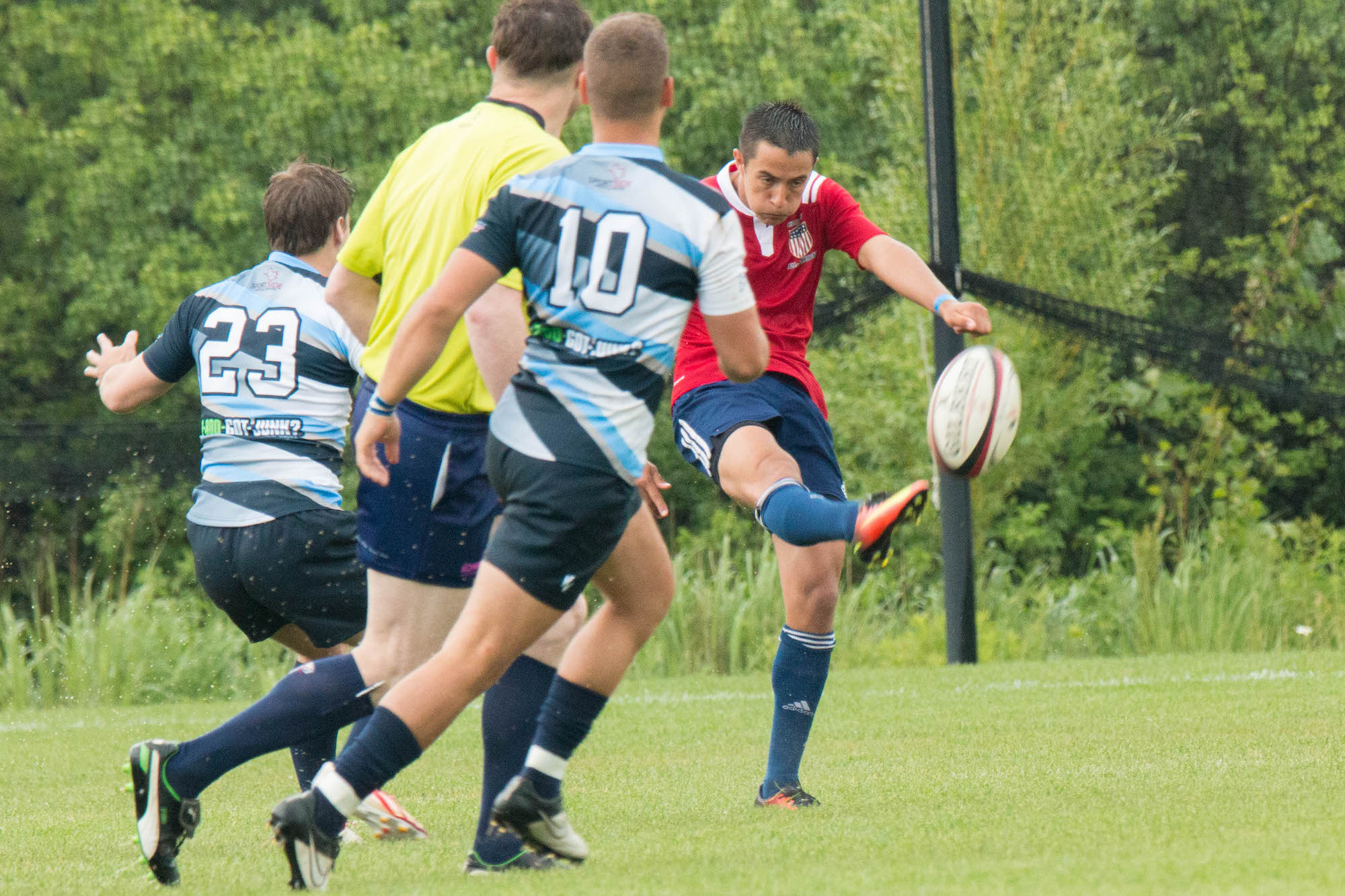 Mike Weir boots the ball down the field against Ontario U19s. Allison Bradfield photo.